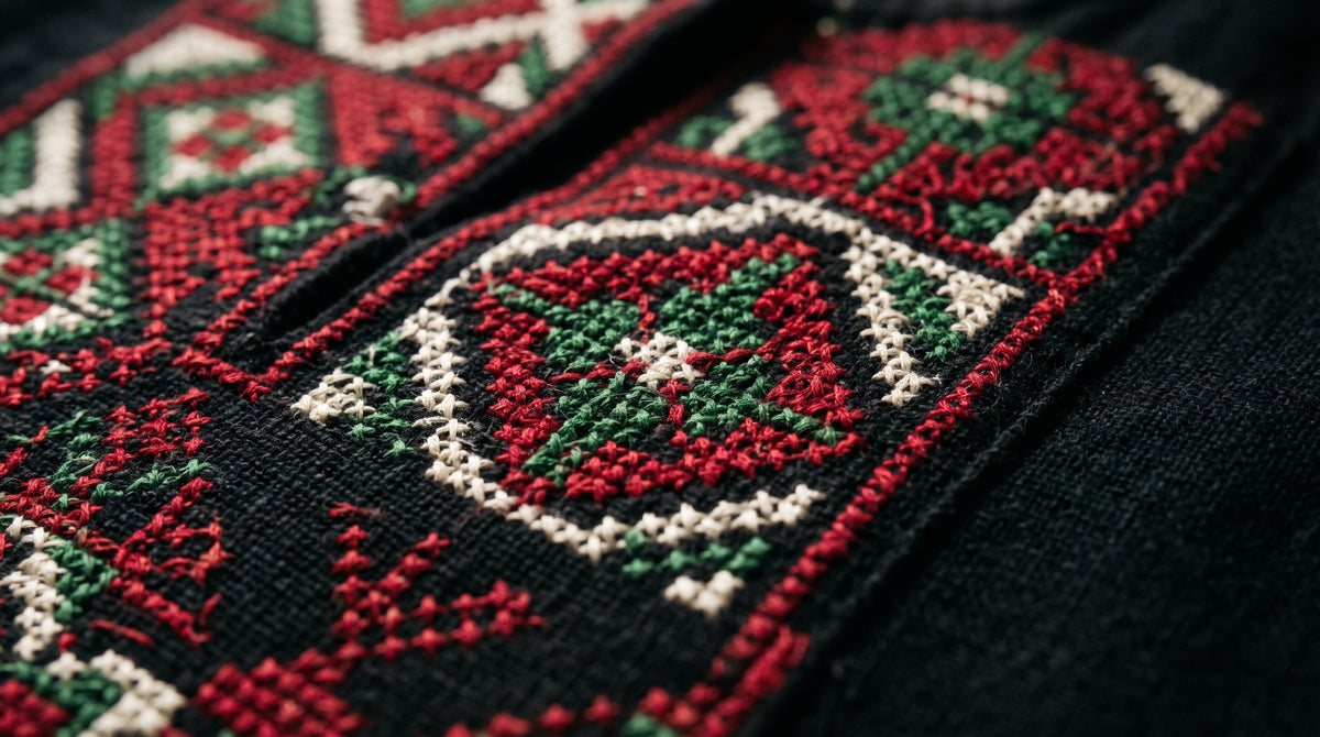 Handcrafted Palestinian embroidered thobe garment representing cultural heritage and political resilience