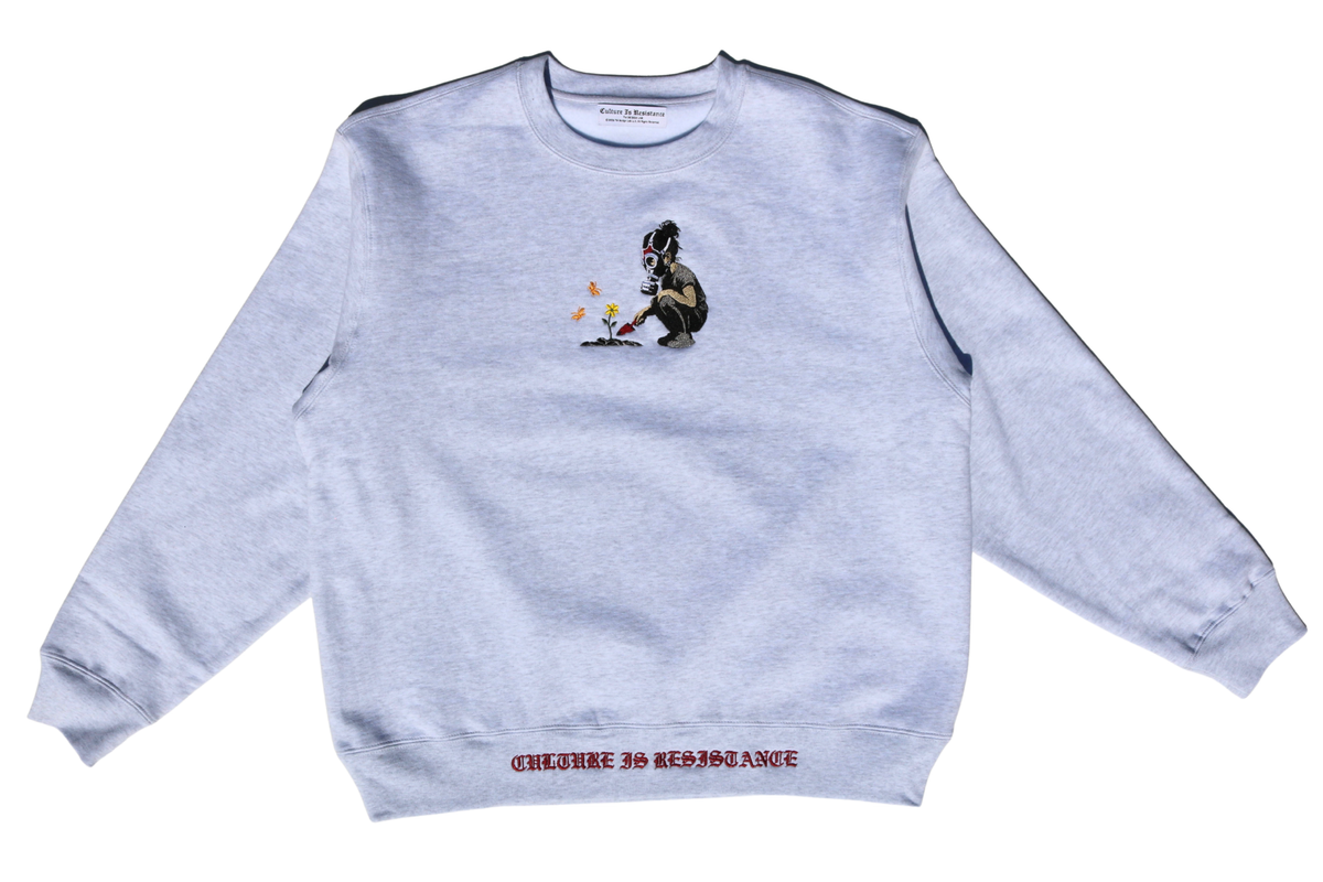 Culture is Resistance gray crewneck featuring embroidered Palestinian Gardener botanical illustration
